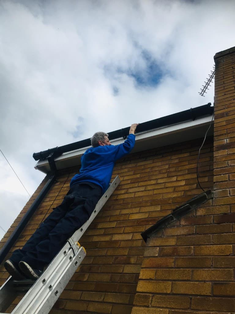 Gutter replacement on pebbledash house in Hyndburn by Holgates Roofing